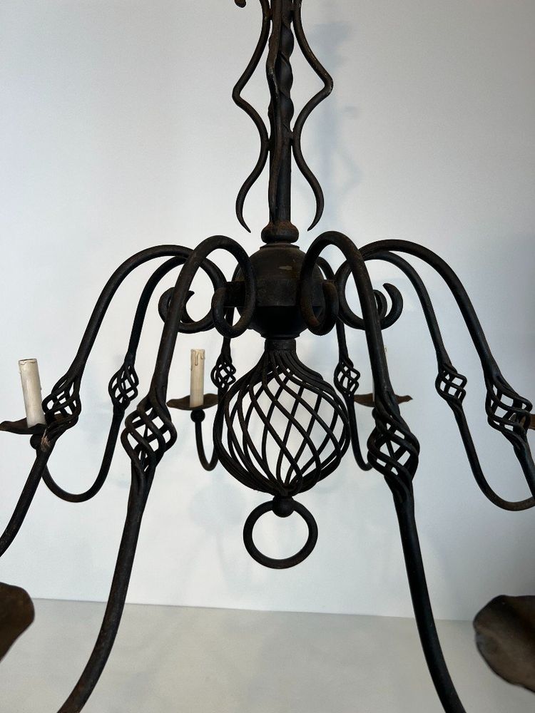 Important 8-Arm Wrought Iron Chandelier. French work. Circa 1940