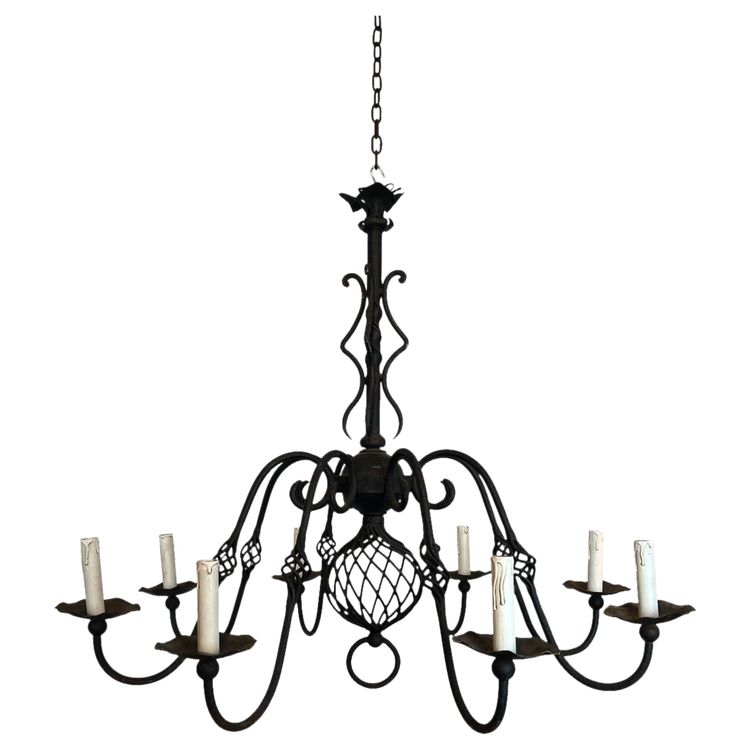 Important 8-Arm Wrought Iron Chandelier. French work. Circa 1940