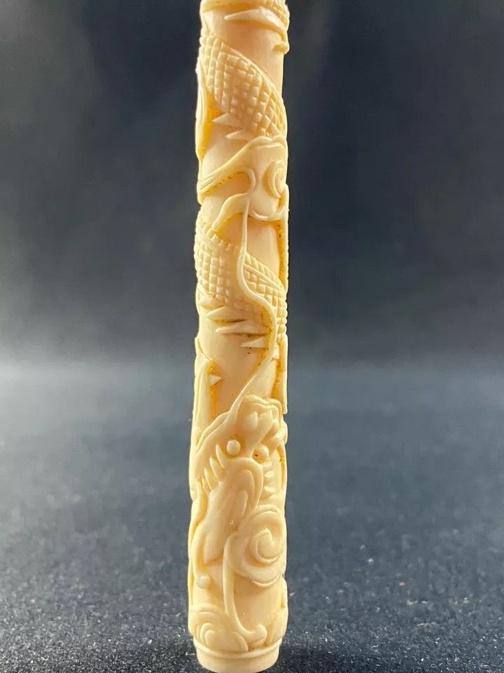 Cigarette smoker richly carved dragon design China Indochina Far East