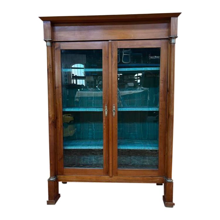 Empire style bookcase/display cabinet in cherry wood.