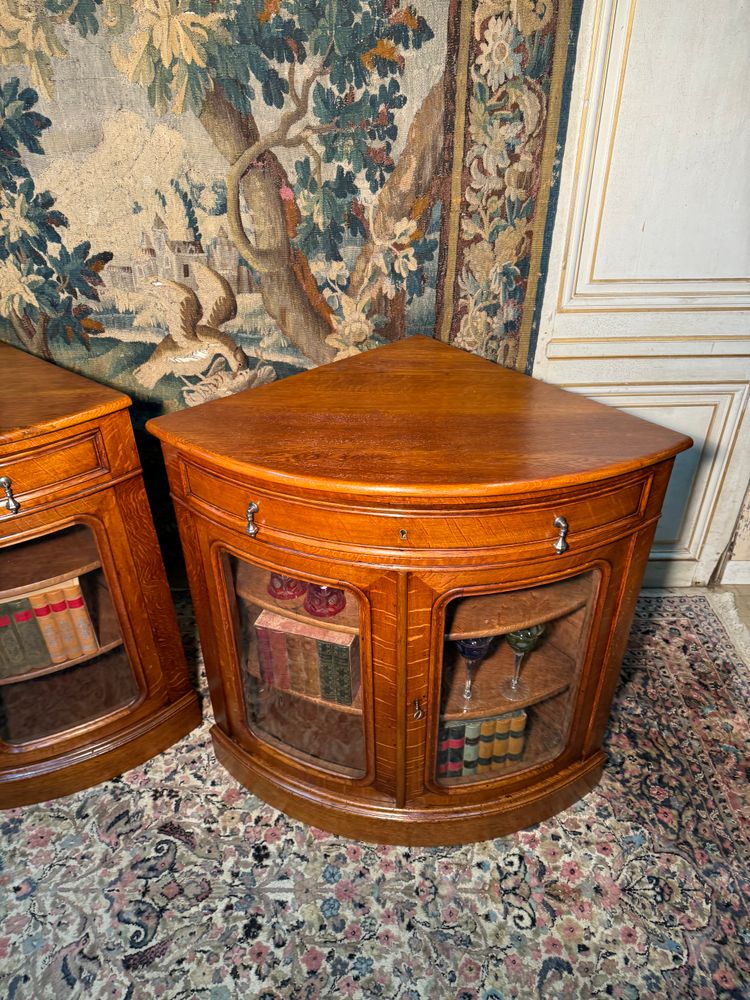 Pair of 19th century glass corner cabinets in blond oak