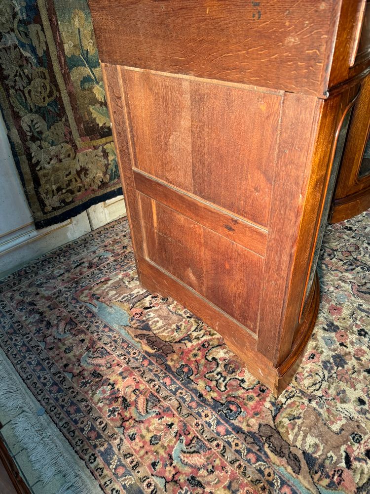 Pair of 19th century glass corner cabinets in blond oak