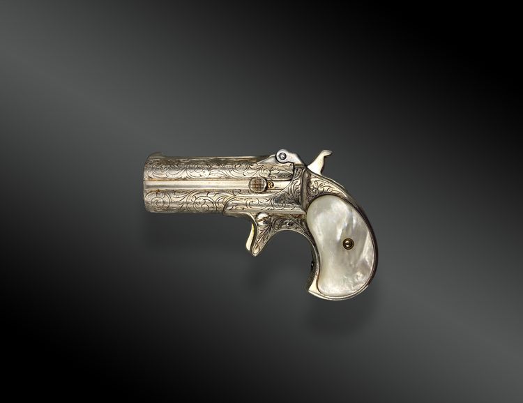 Remington Over and Under pistol, factory engraved, nickel-plated, mother-of-pearl plates 19th century USA