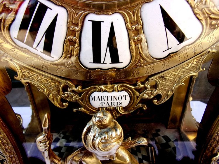 Cartel "aux Têtes enturbannées" in Boulle marquetry and its console, 140 cm