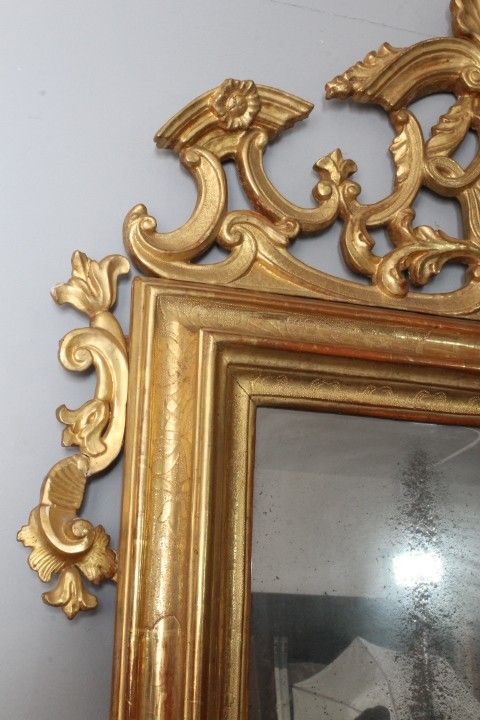 Antique mirror mid 1700s XVIII SEC . Pure gold . with beautiful cymatium. Meas 135 x cm 95