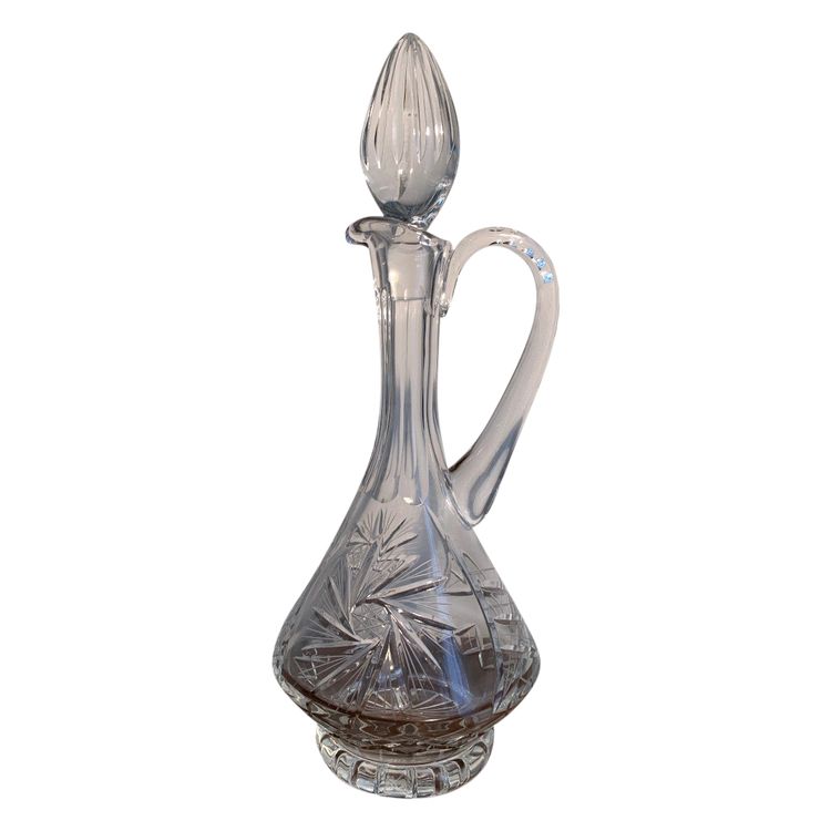 Hand-blown, hand-cut crystal decanter.