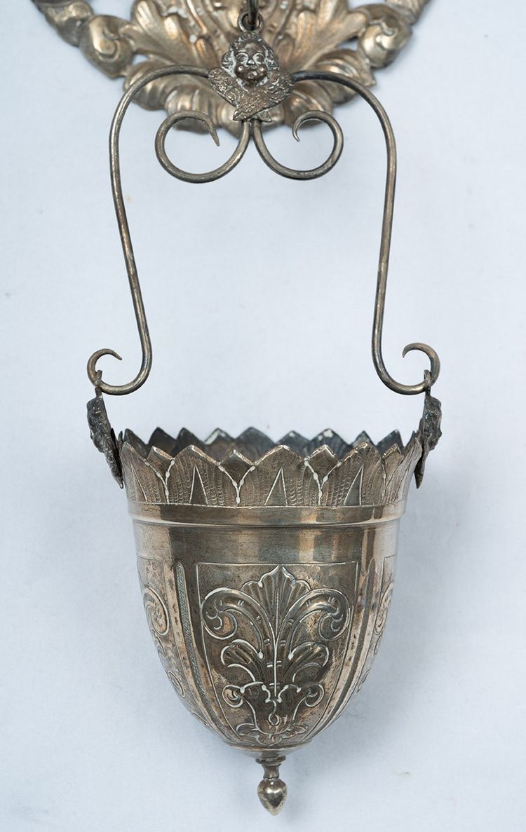 Pair of antique chased silver holy water fonts. Rome, 19th century.