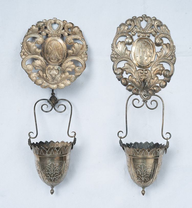 Pair of antique chased silver holy water fonts. Rome, 19th century.