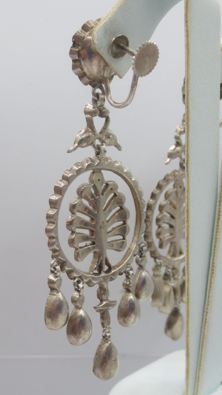 Girandole earrings.