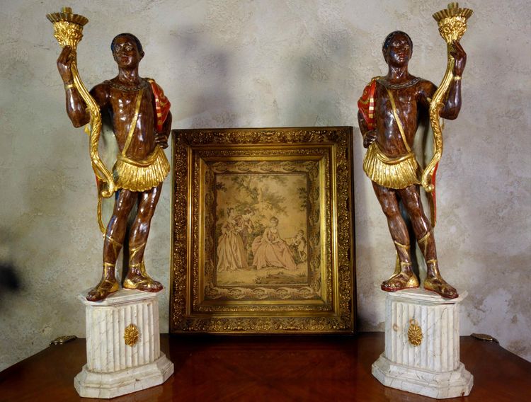 Pair of polychrome wooden torch holders