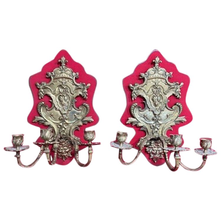 Pair of three-light wall sconces in finely chased gilt bronze with the coat of arms of France.