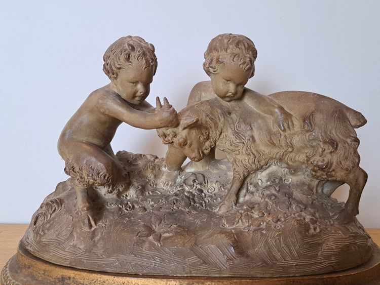 Joseph d'Asté, Gruppo di bambini e fauna che giocano con una capra, Terracotta, Firmato, XIX secolo.