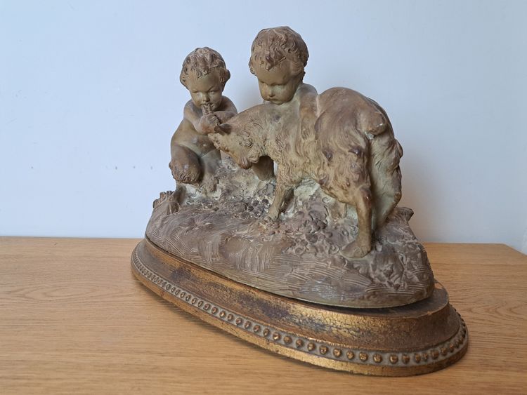 Joseph d'Asté, Gruppo di bambini e fauna che giocano con una capra, Terracotta, Firmato, XIX secolo.