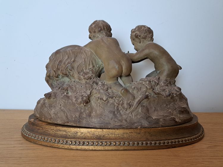 Joseph d'Asté, Gruppo di bambini e fauna che giocano con una capra, Terracotta, Firmato, XIX secolo.