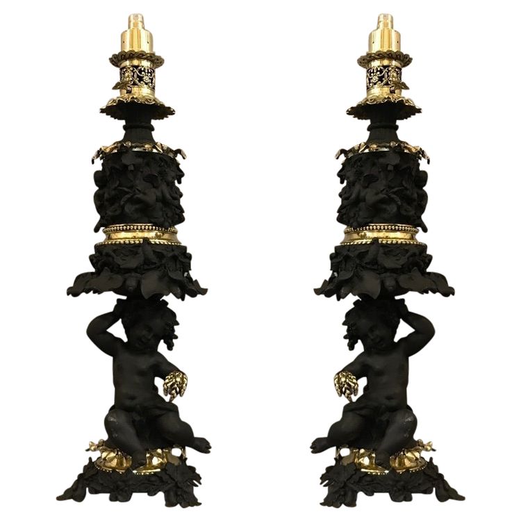 Beautiful pair of spelter, brass and bronze lamps from the 19th century