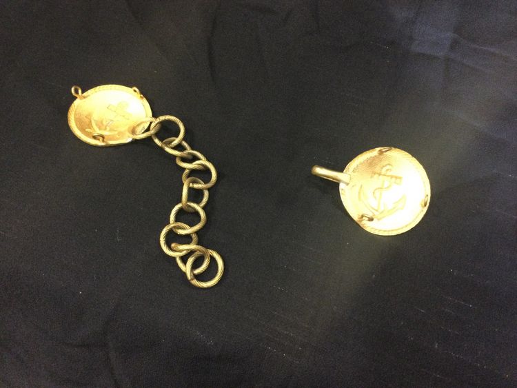 Officer's cape buckles