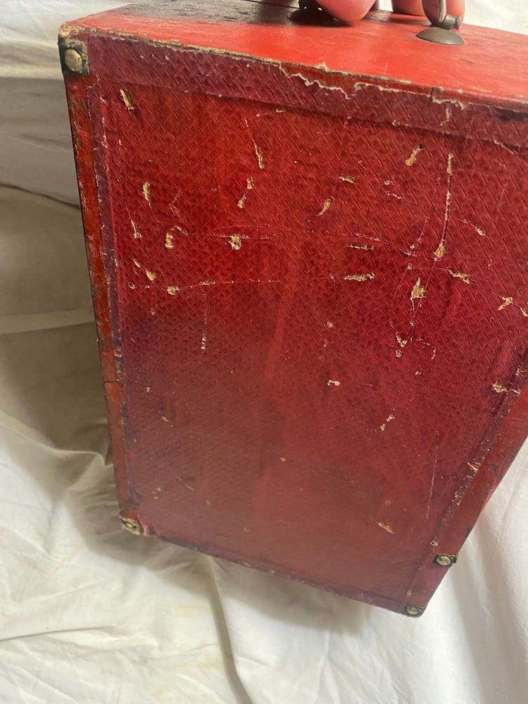 19th century red lacquered domed studded and strapped table box