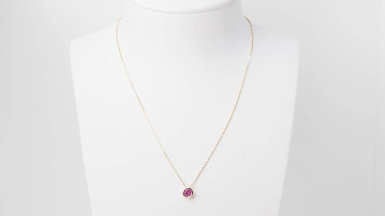 Yellow gold and ruby solitaire necklace