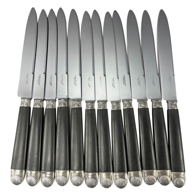 12 table knives ebony handle shell ferrule