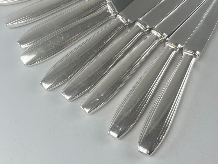 Box of 24 art deco style knives in silver-plated metal