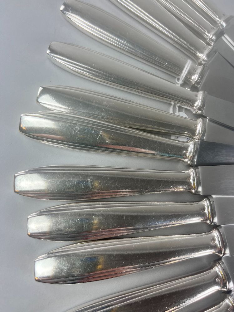 Box of 24 art deco style knives in silver-plated metal