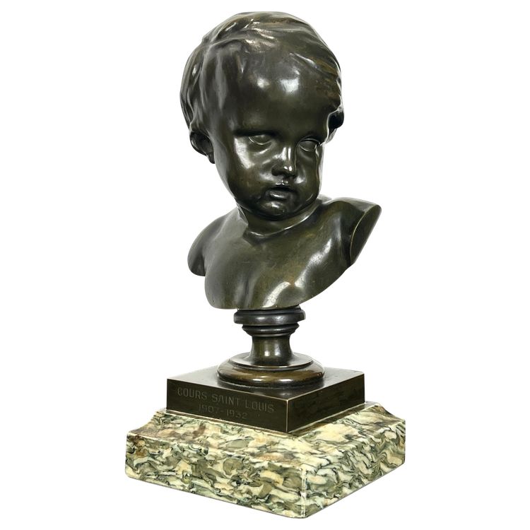 PATINATED BRONZE BUST OF A PUTTO AFTER FRANCOIS DUQUESNOY ON MARBLE BASE