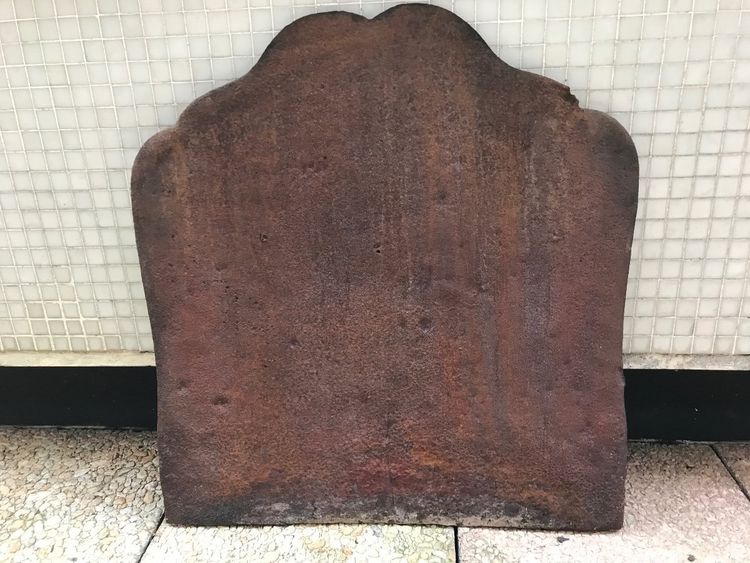 Antique cast iron fireback from the 19th century