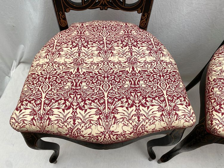 Pair of Napoleon III chairs, blackened wood and gold decor