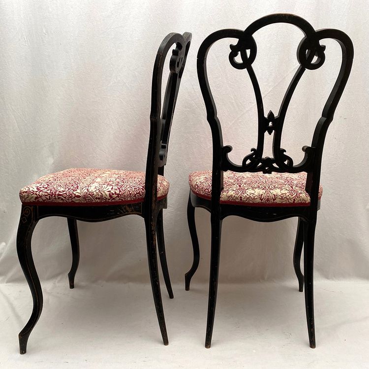 Pair of Napoleon III chairs, blackened wood and gold decor