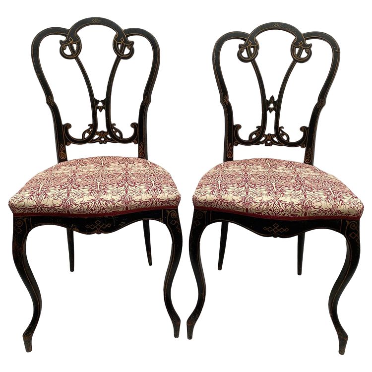 Pair of Napoleon III chairs, blackened wood and gold decor