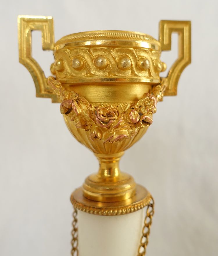 Pair of gilt bronze and marble cassolettes with upside-down candlesticks, Louis XVI style