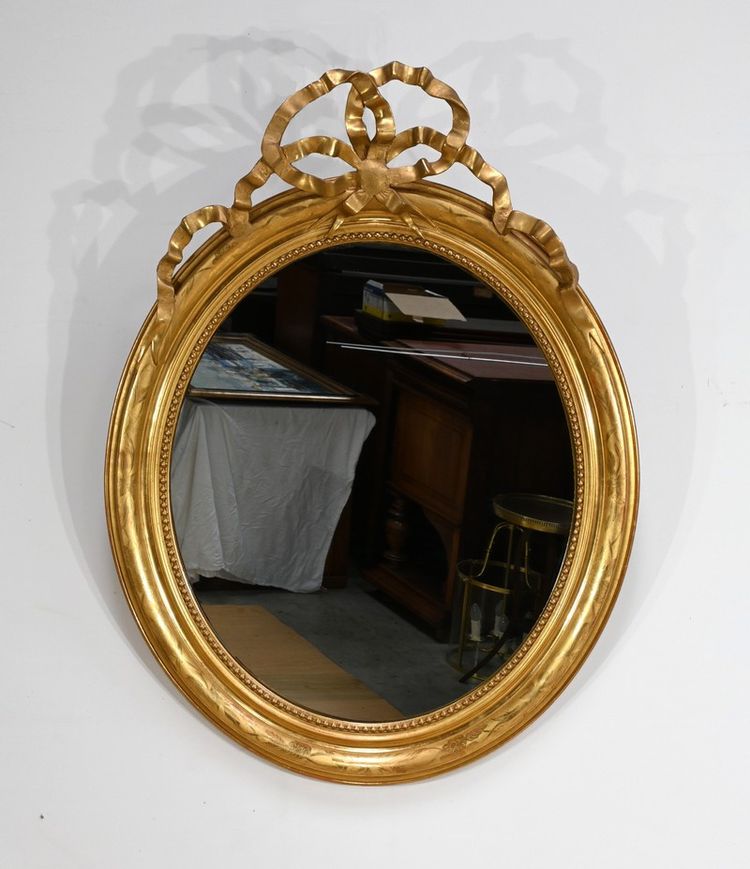 Oval mirror in gilded wood, Louis XVI style, Napoleon III period - Mid-19th century