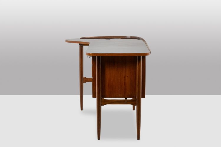 Free-form teak desk. 1950s. LS614859Q