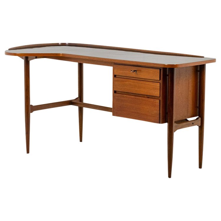 Free-form teak desk. 1950s. LS614859Q