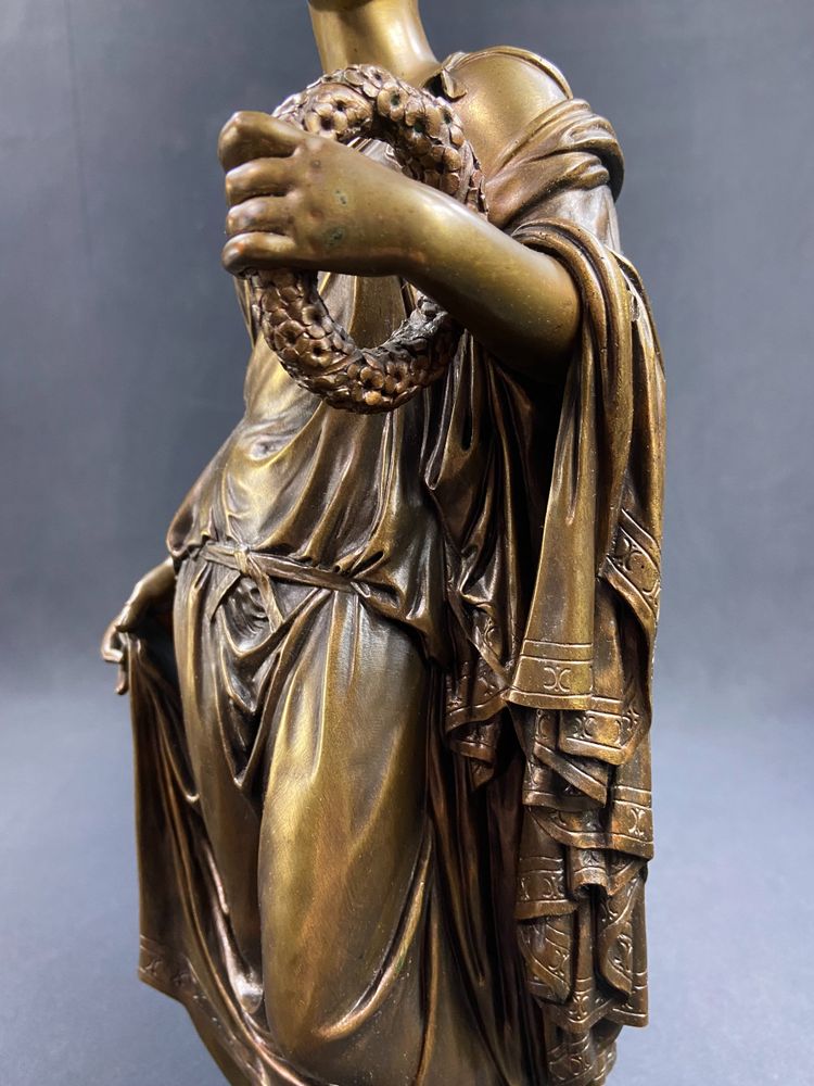 19th-century bronze sculpture of an antique woman with a foliage crown