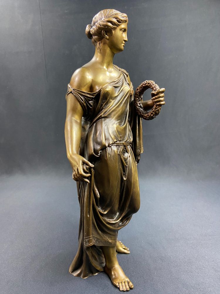 19th-century bronze sculpture of an antique woman with a foliage crown