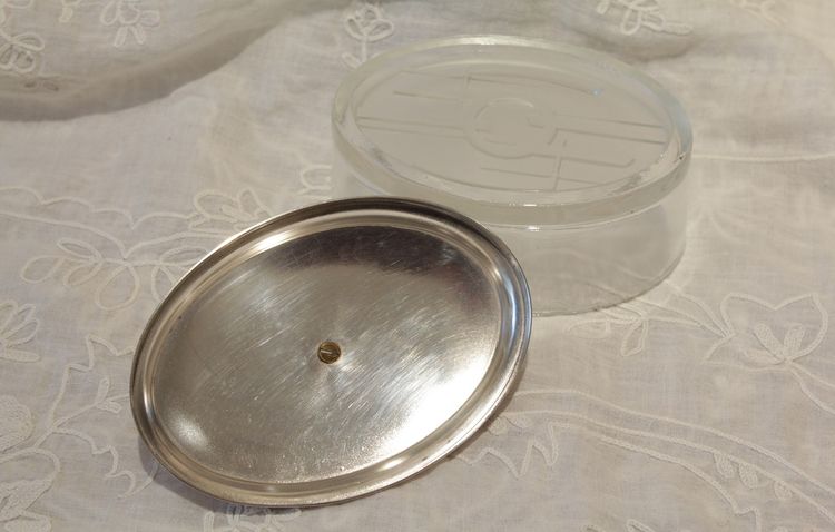 Oval glass and silver-plated metal box circa 1930, Art Deco geometric motifs