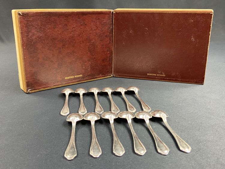 Complete set of 12 Louis XV style silver plated moka spoons signed Hermès