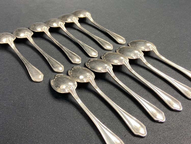 Complete set of 12 Louis XV style silver plated moka spoons signed Hermès