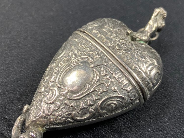 19th century Louis XV style solid silver reliquary pendant box with Putti decoration