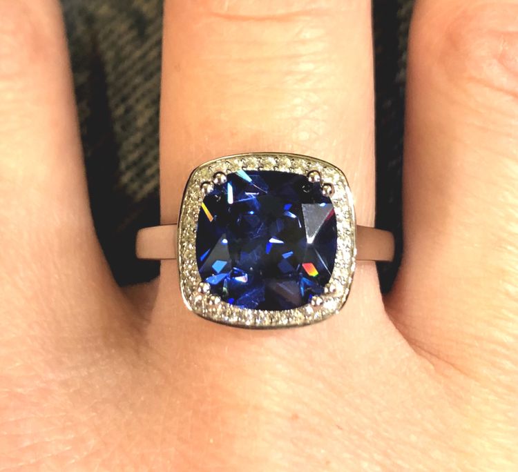 Blue stone and zircon ring