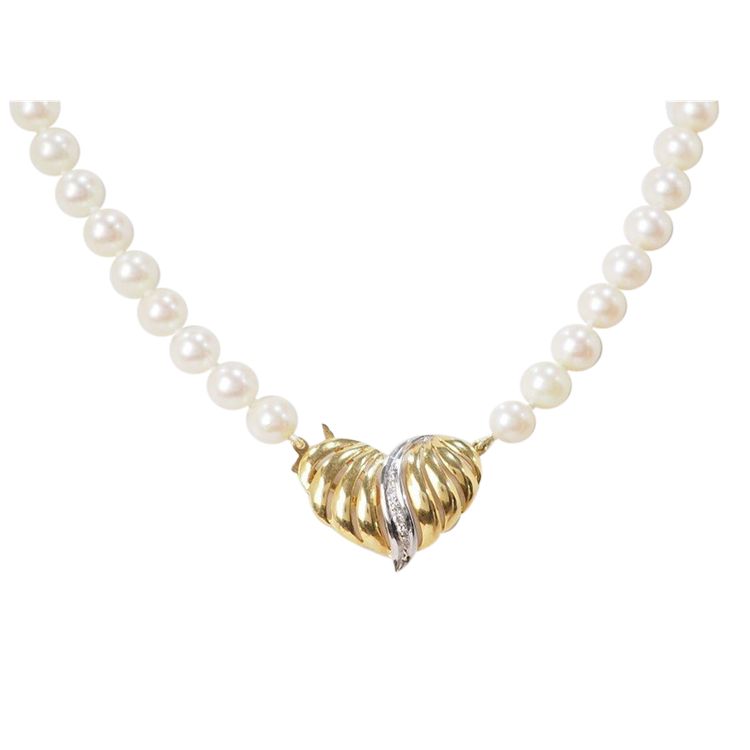 Necklace in yellow gold and cultured pearls