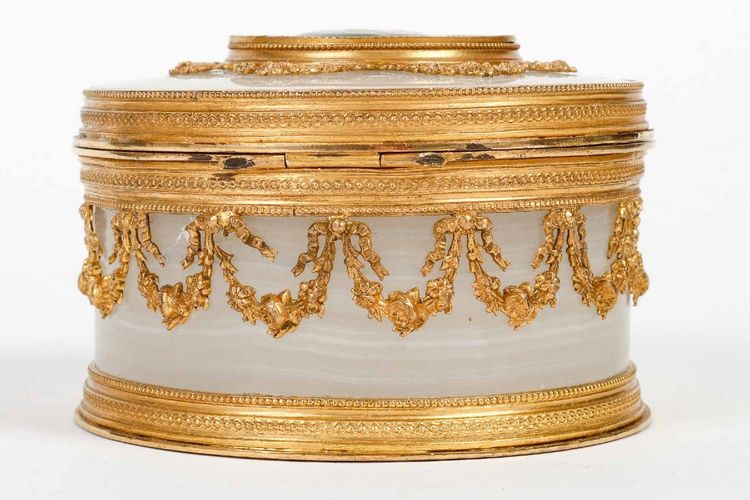 A late 19th century alabaster and gilt bronze jewelry box