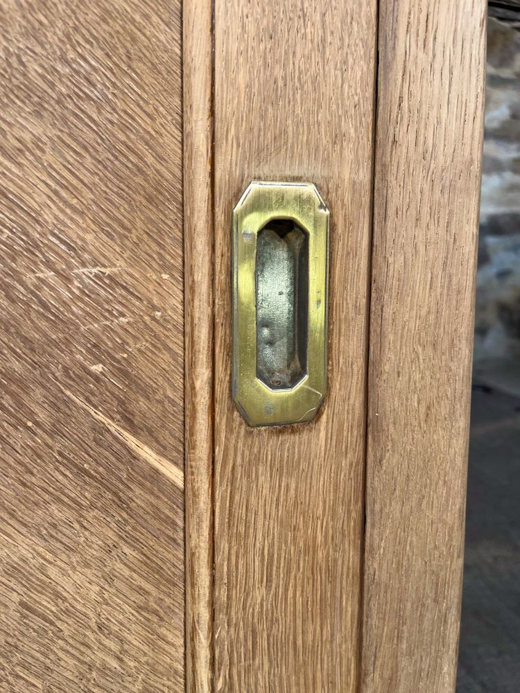 Antique oak cabinet with sliding door