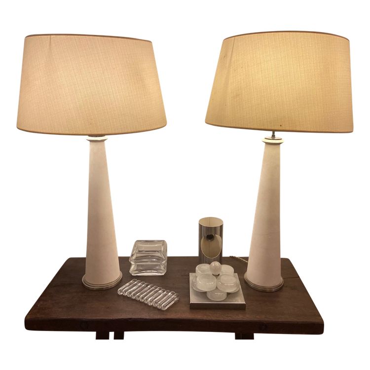 Pair of modernist stone and bronze lamps.