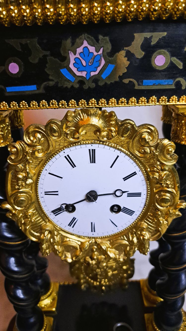 Napoleon lll blackened wood clock with twisted columns - second half of the 19th century