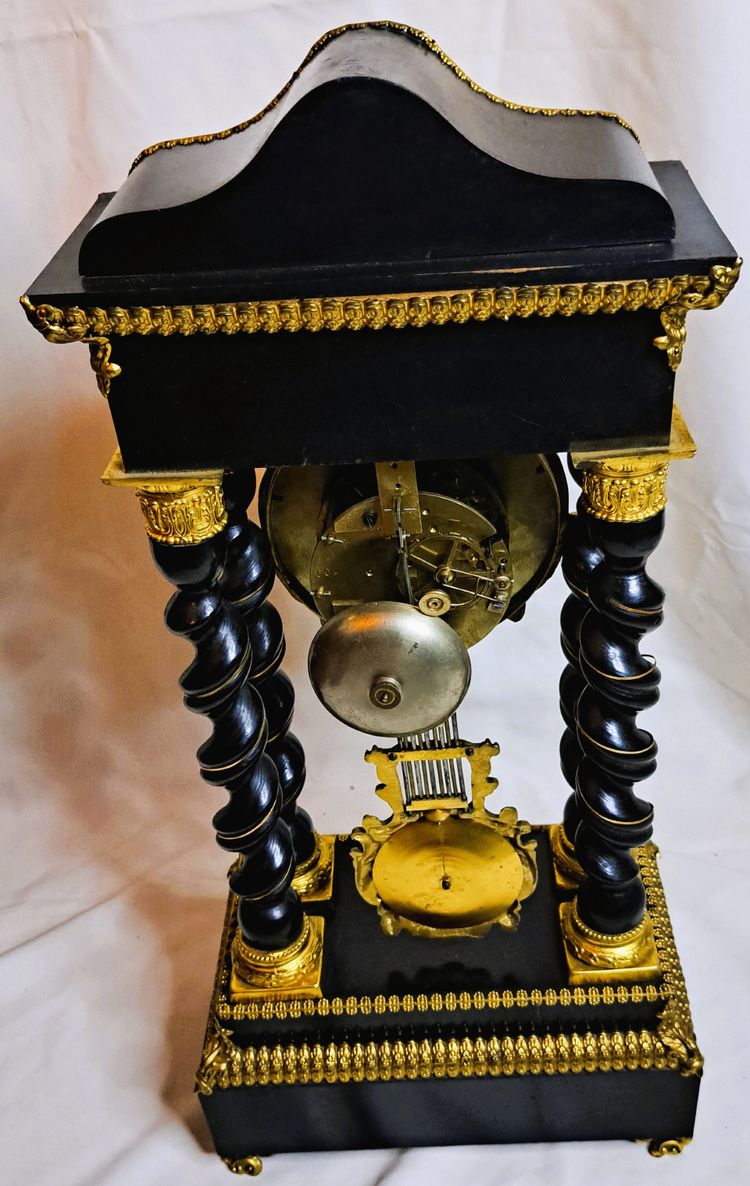 Napoleon lll blackened wood clock with twisted columns - second half of the 19th century