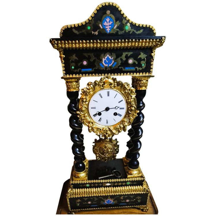 Napoleon lll blackened wood clock with twisted columns - second half of the 19th century