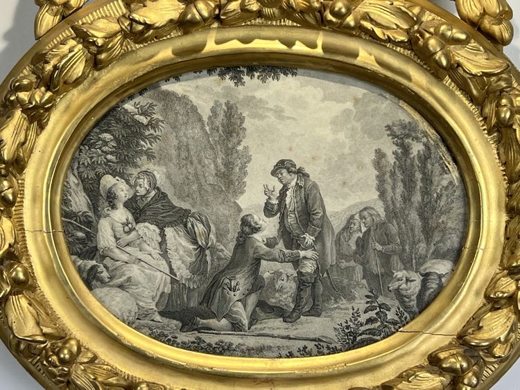 EIGHTEENTH CENTURY OVAL FRAME IN GILDED SCULPTTED WOOD AND ITS FURNACED FRONTIER