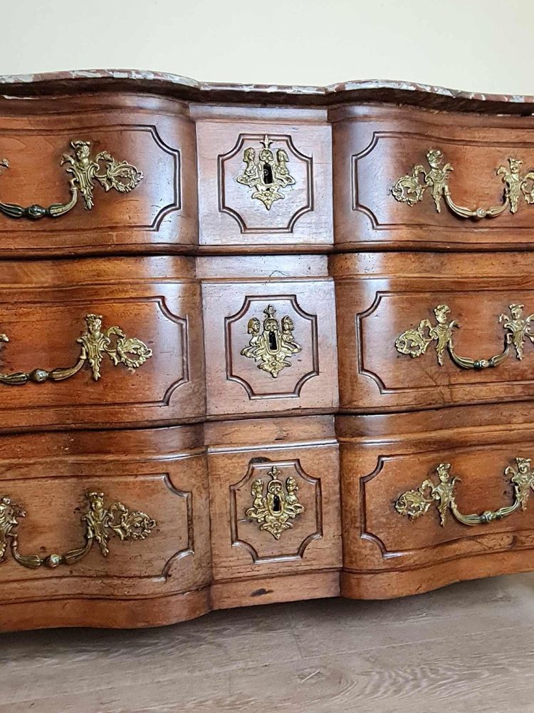 Louis XIV period Solid walnut crossbow chest of drawers